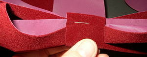 Finish tab by stapling it in the back